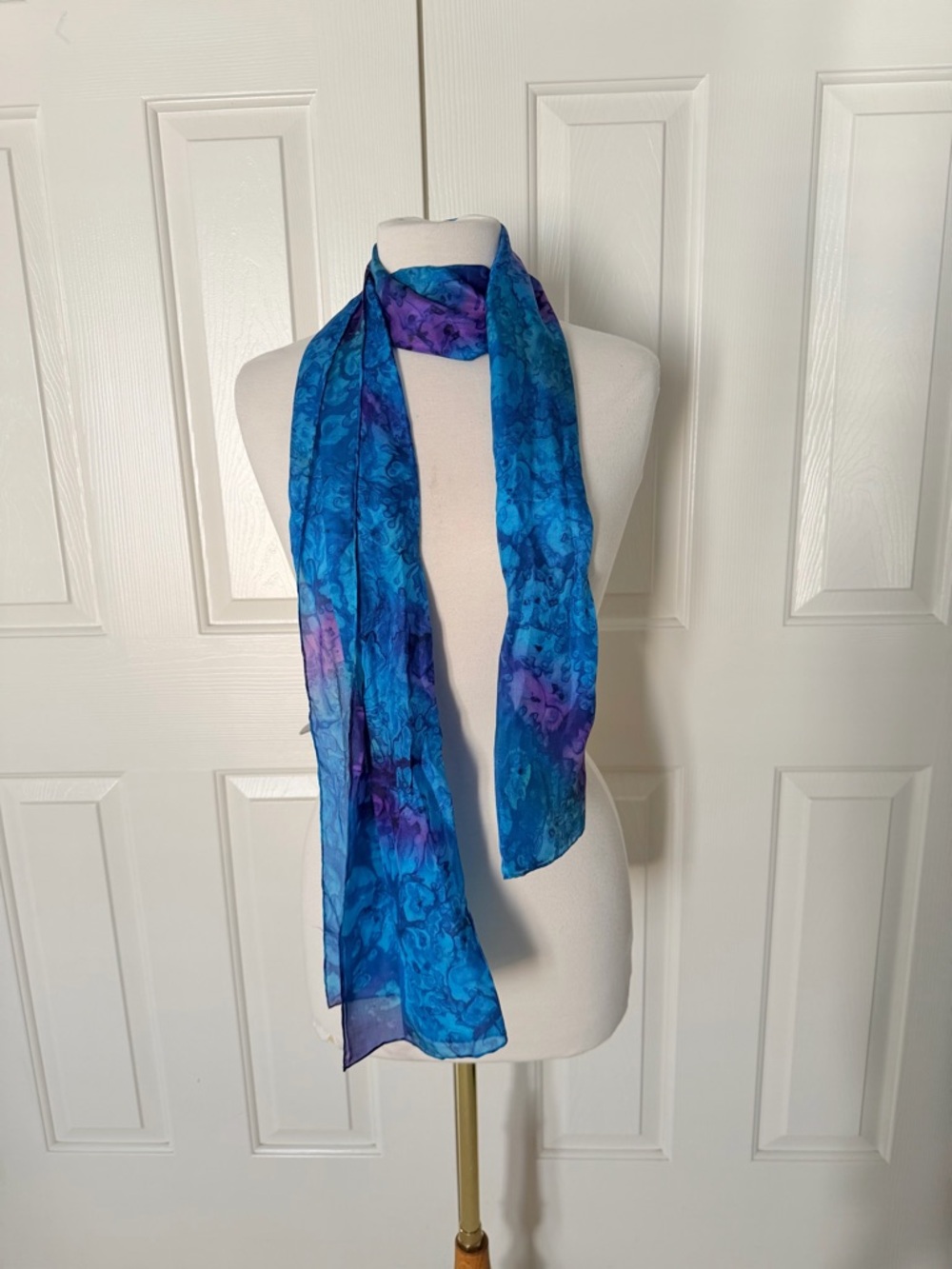 Beautiful hand-dyed women’s silk scarf featuring shades of blue and purple